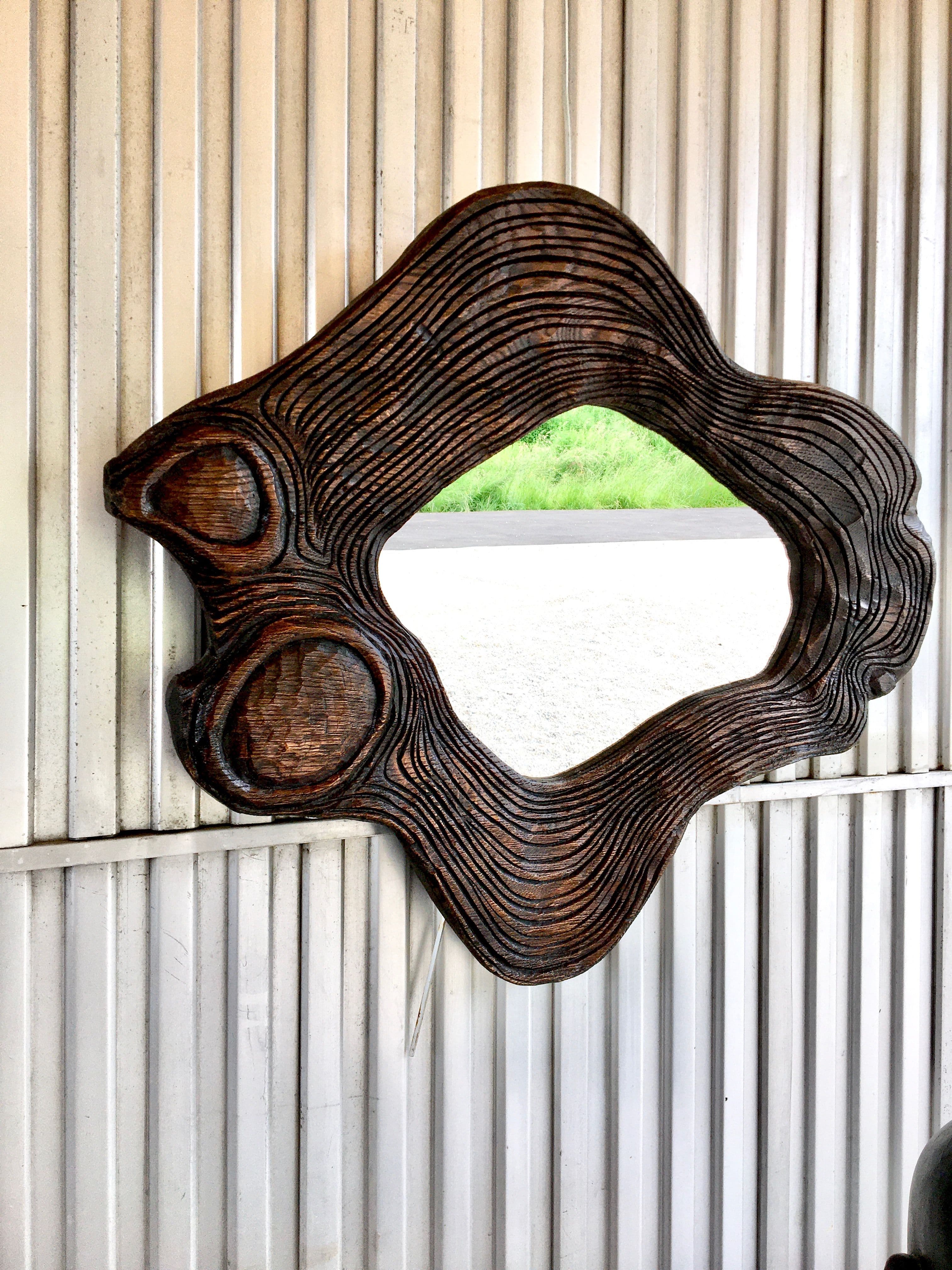 Miroir en chêne sculpté, patiné